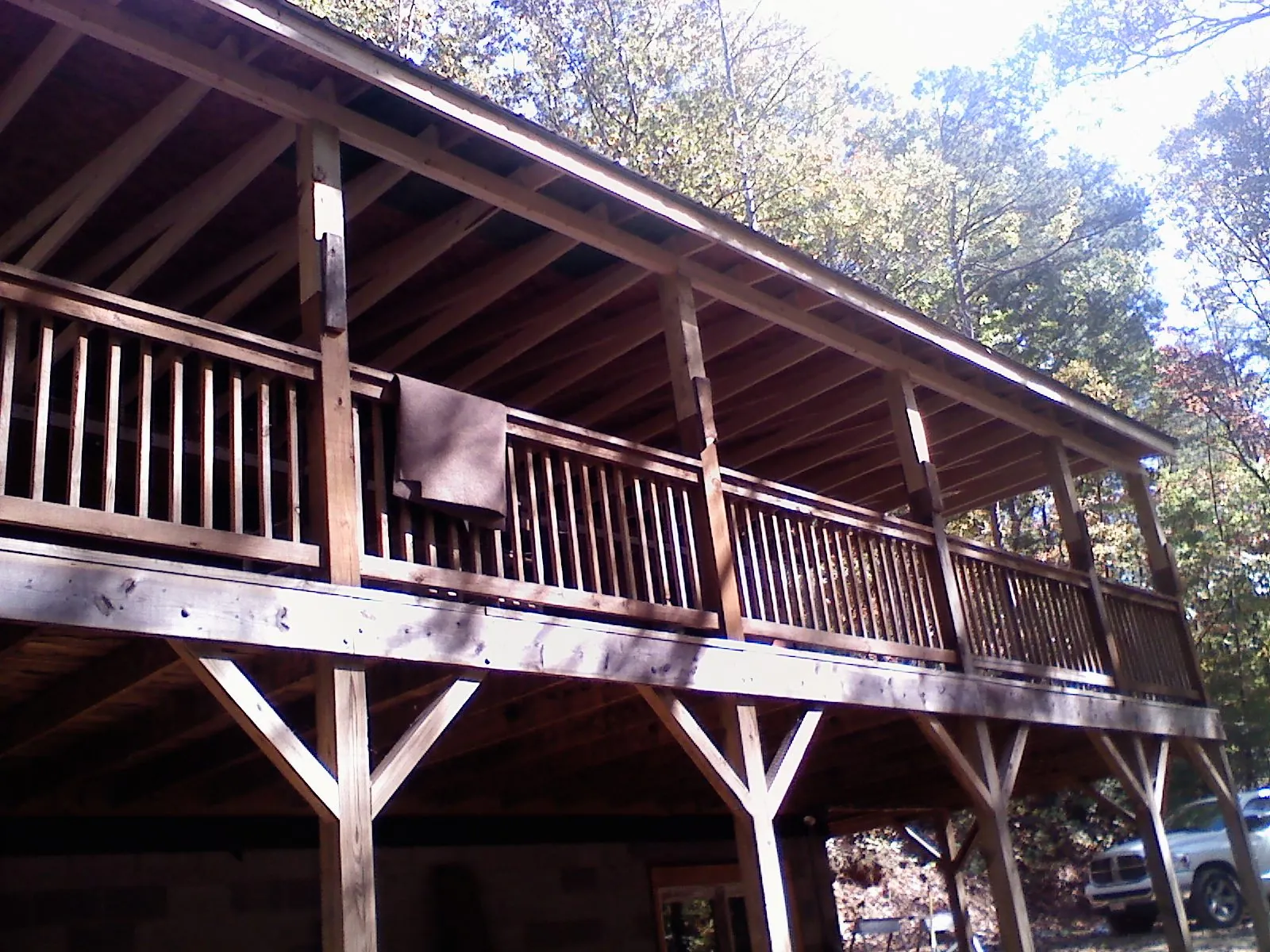 Timber framing under a new elevated porch and deck — Roof Leak Repair in Giltner by Roofing Brothers